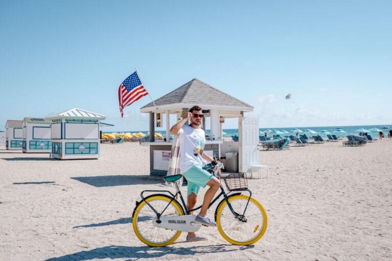 the beach Miami, men on bicycle colorful Miami beach